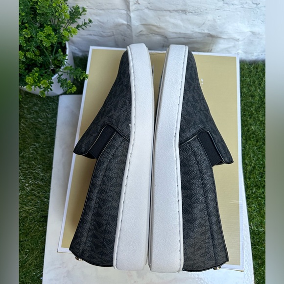 MICHAEL MICHAEL KORS
Women's Keaton Slip-On Logo
Sneakers size 8.5
BLACK LOGO - Picture 9 of 16